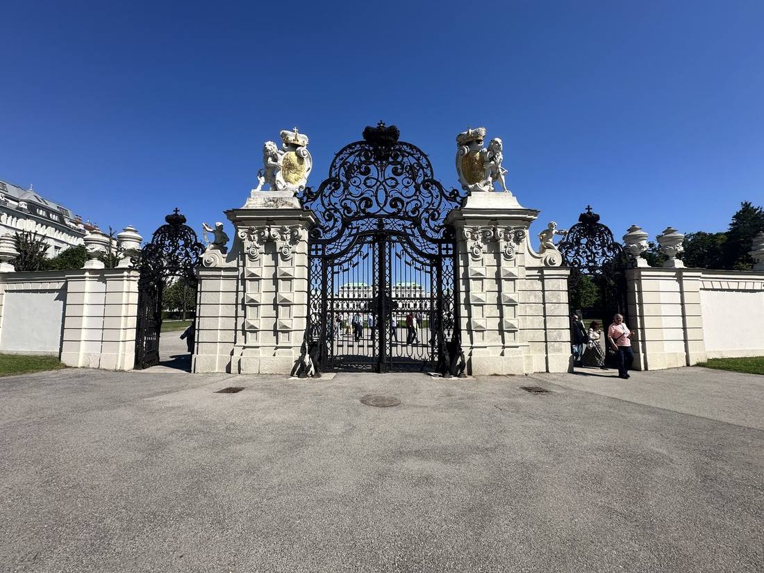 Wrought-iron Belvedere gate with crowned lions and gilded shields
