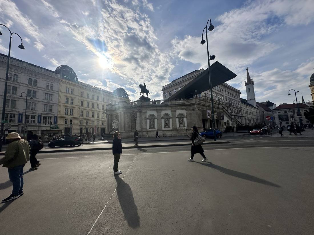 Albertinaplatz with equestrian statue, Hollein titanium cantilever and Augustinerkirche