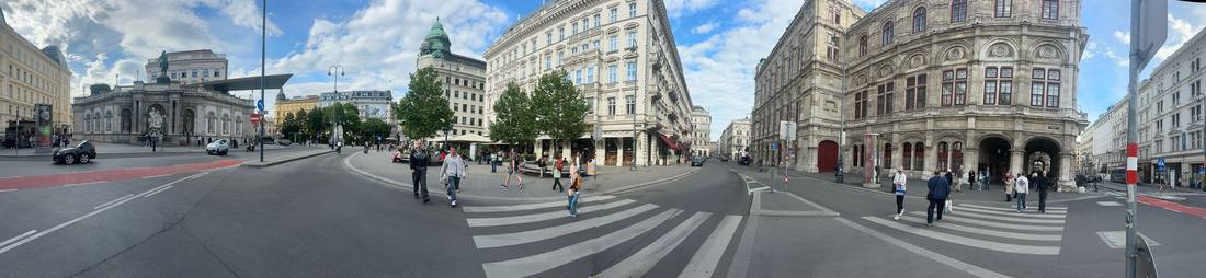 Panoramic view of State Opera, Hotel Sacher, Albertina, with Bitzinger sausage stand on the left